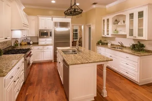 Renovated open-concept living space with new flooring, trim, and finishes